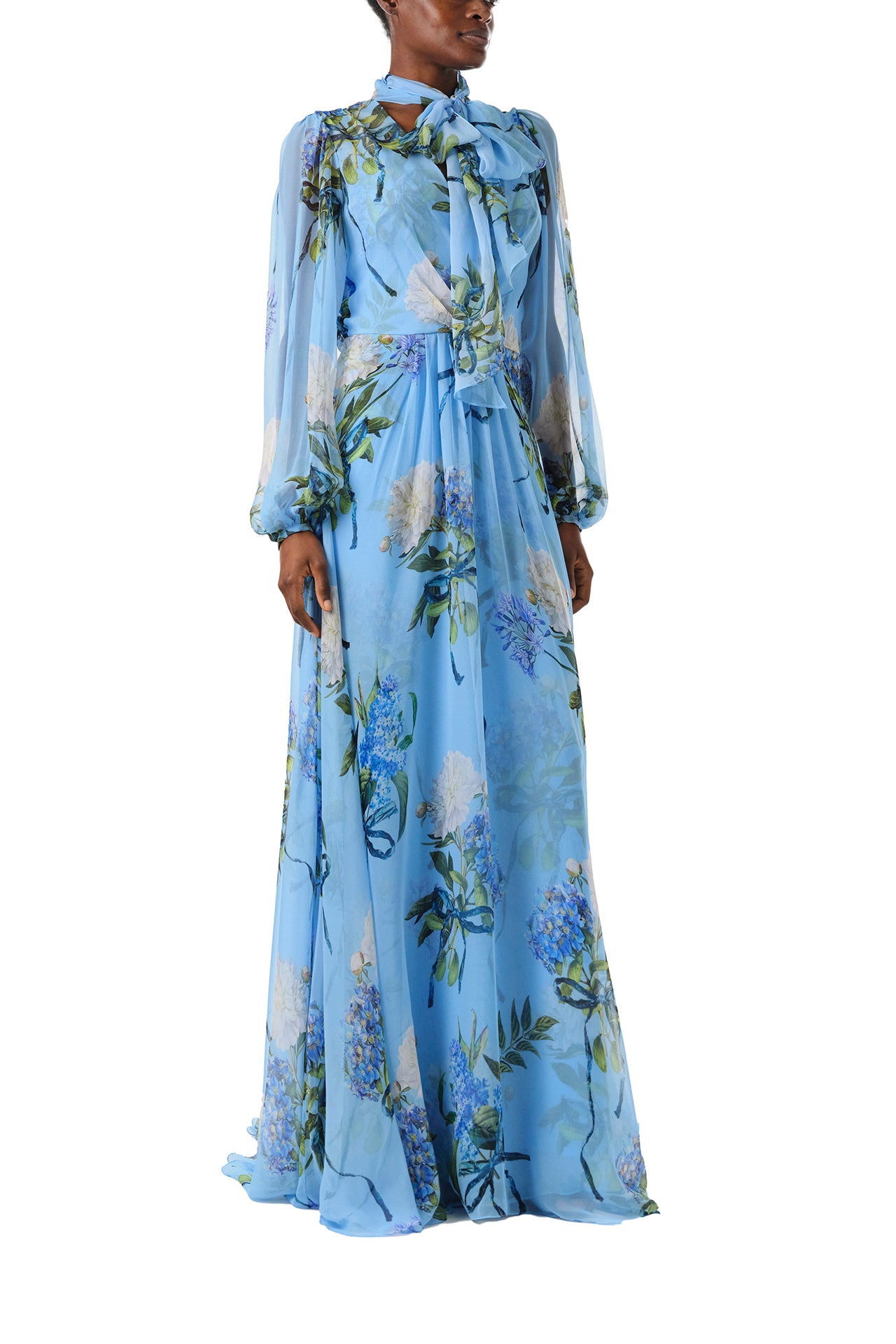 Monique Lhuillier Fall 2024 long sleeve gown in blue floral printed chiffon with self-tie neckline - right side.