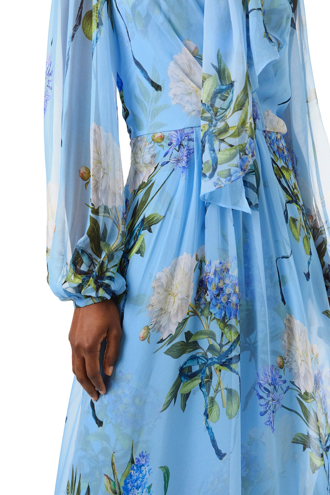 Monique Lhuillier Fall 2024 long sleeve gown in blue floral printed chiffon with self-tie neckline - detail.