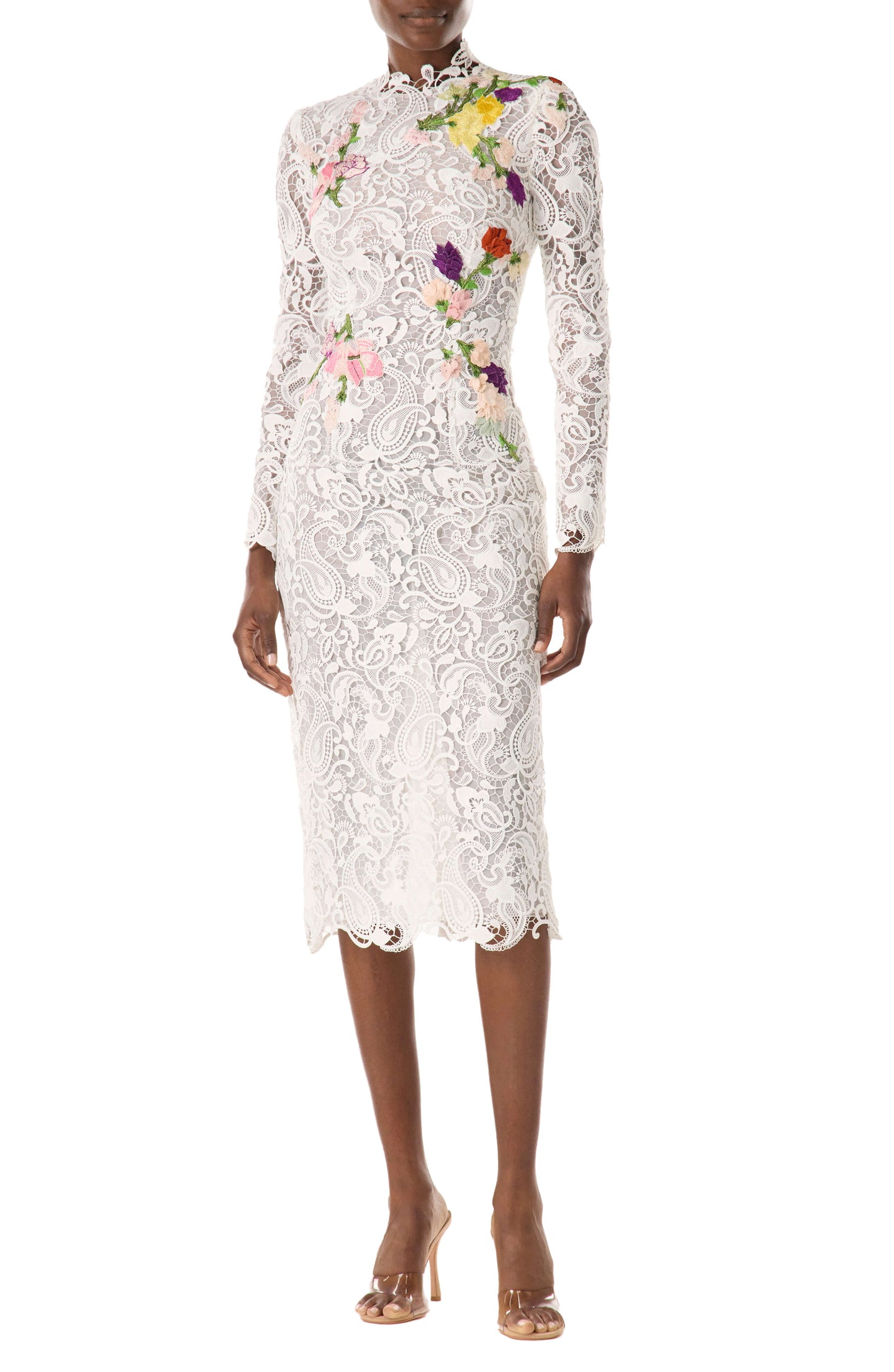 Monique Lhuillier midi length, long sleeve white lace dress with floral embroidery.