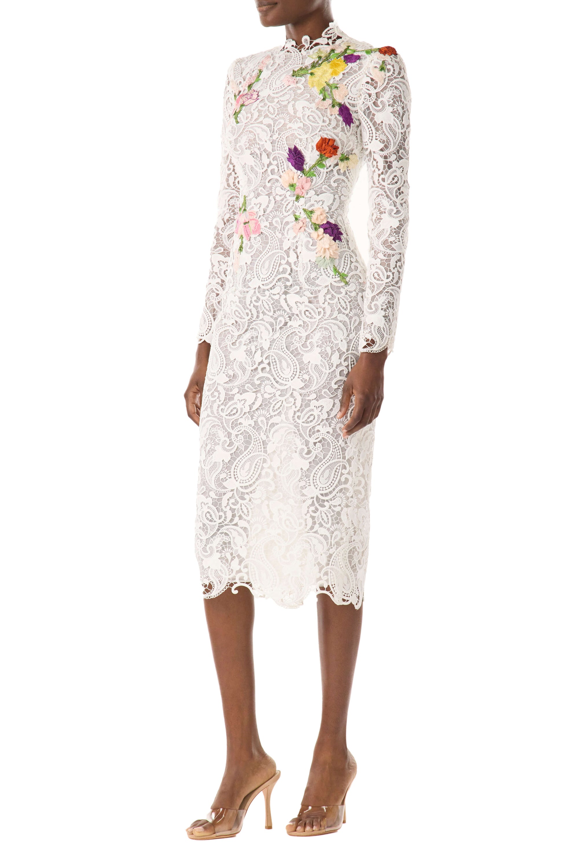 Monique Lhuillier midi length, long sleeve white lace dress with floral embroidery.