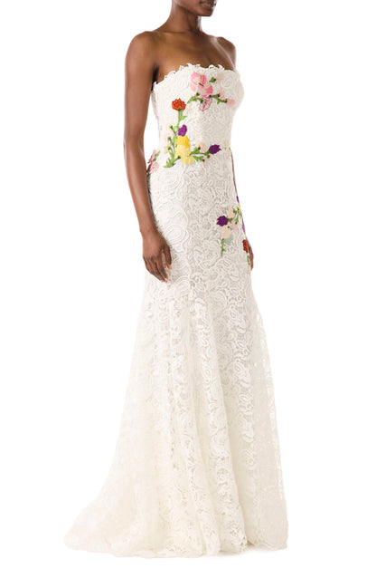 Monique Lhuillier white lace strapless gown with floral embroidery.