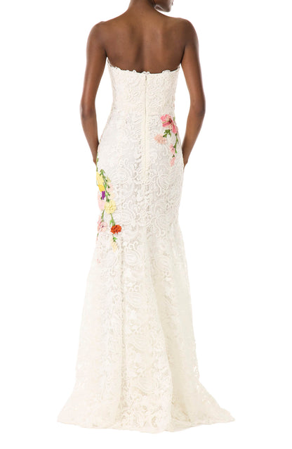 Monique Lhuillier white lace strapless gown with floral embroidery.