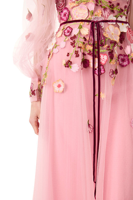 Monique Lhuillier jewel neck midi dress with sheer long sleeves in pink tulle and 3d floral embroidery.