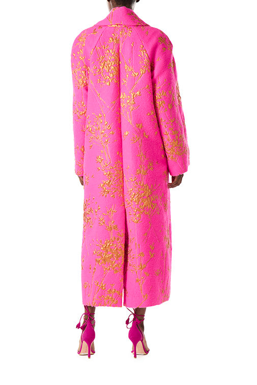 Monique Lhuillier fuchsia wool oversized coat with gold motif embroidery.