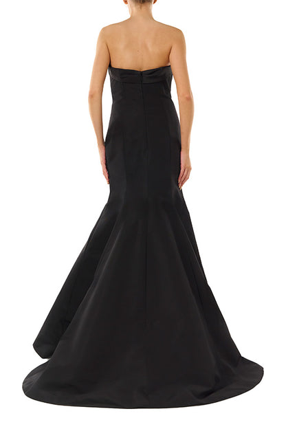 Monique Lhuillier noir strapless, faille evening gown with draped bodice and mermaid skirt.