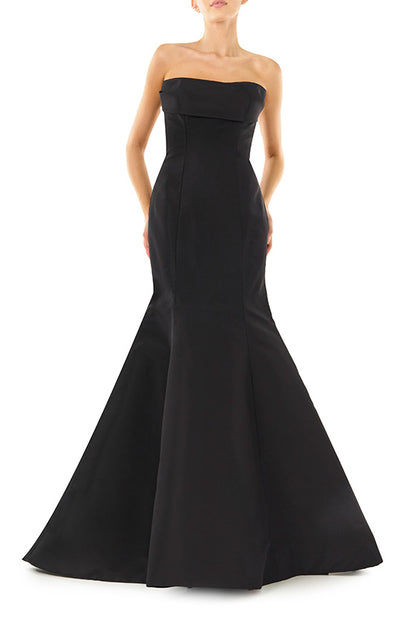 Monique Lhuillier noir strapless, faille evening gown with draped bodice and mermaid skirt.