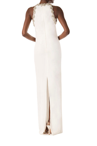 Monique Lhuillier silk white crepe gown with jewel neckline and crystal embroidery.