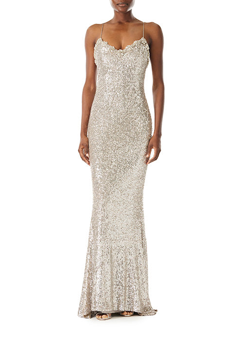 Monique Lhuillier silver sequin slip gown with spaghetti straps.