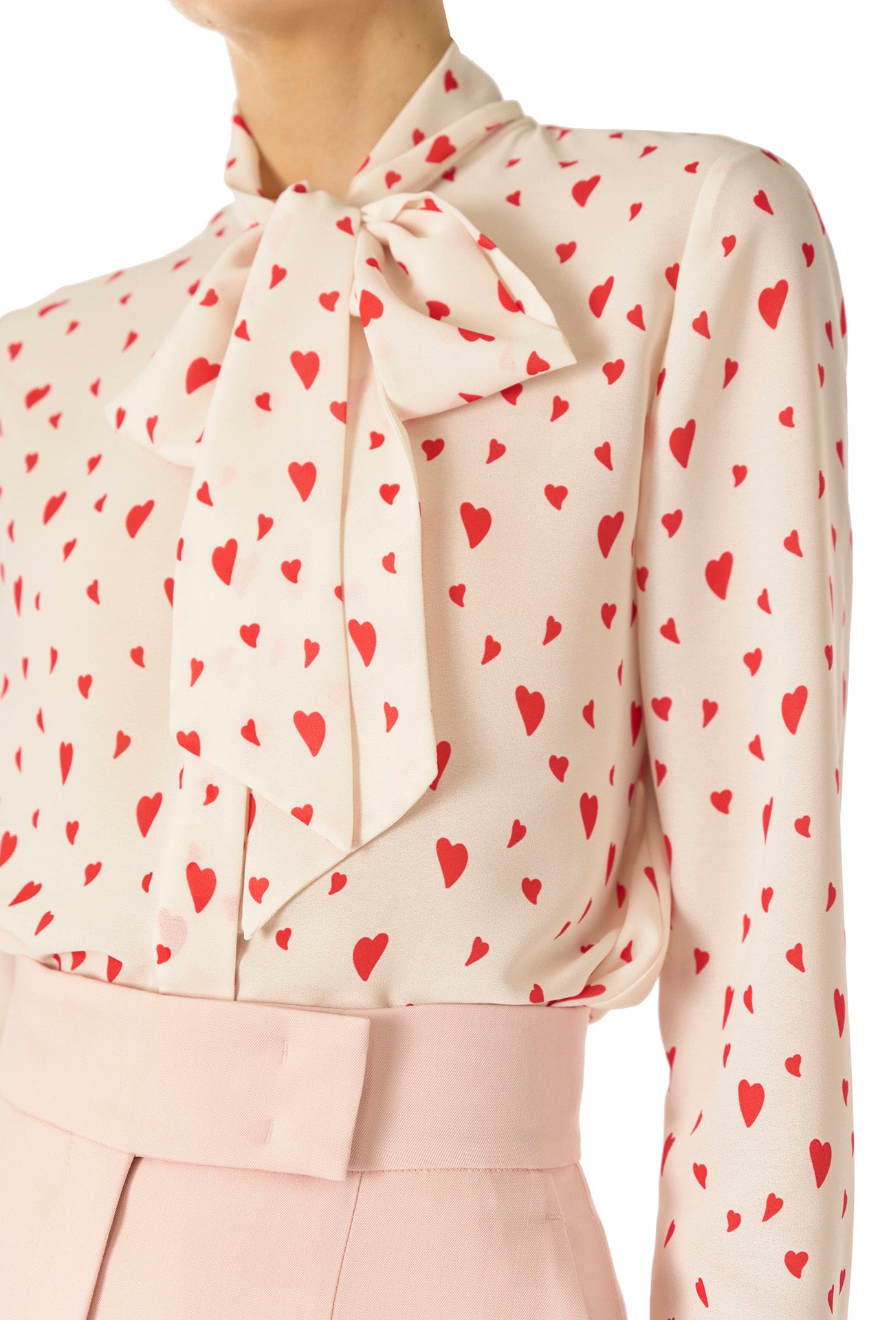 Monique Lhuillier Fall 2024 long sleeve, bow tie blouse in Heart Printed Georgette - detail.