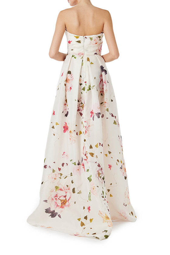 Monique Lhuillier strapless gown with sweetheart neckline and high leg slit in silk white floral gazar.