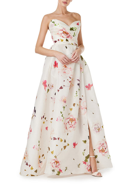 Monique Lhuillier strapless gown with sweetheart neckline and high leg slit in silk white floral gazar.