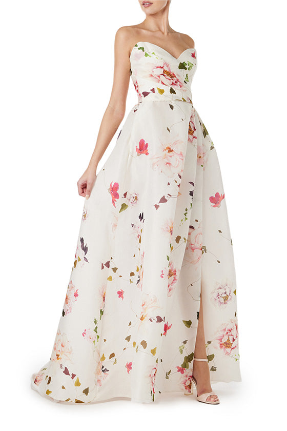 Monique Lhuillier strapless gown with sweetheart neckline and high leg slit in silk white floral gazar.