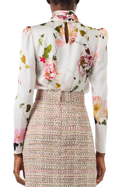 Monique Lhuillier Spring 2024 floral print high neck blouse with long sleeves - back.