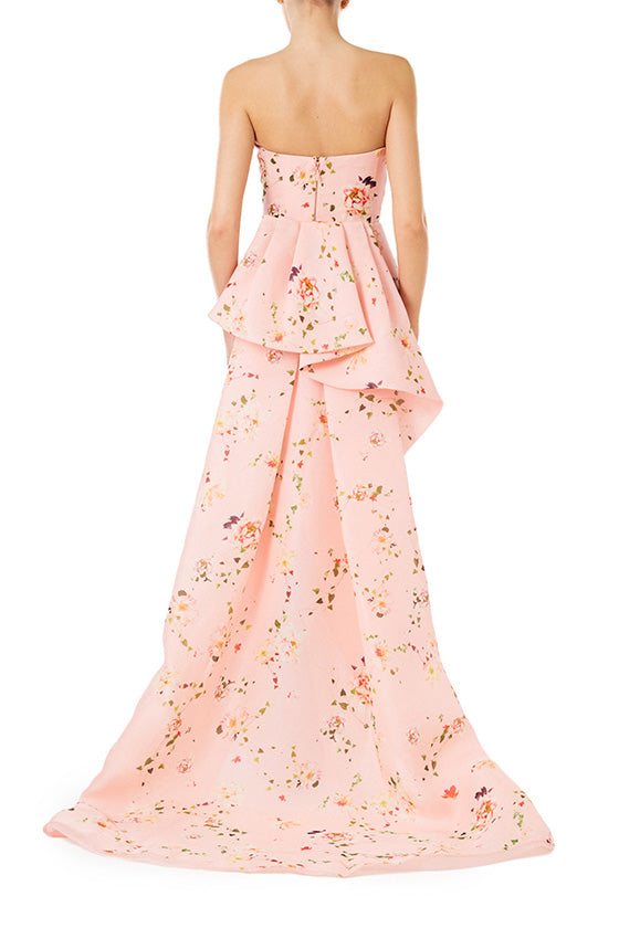 Monique Lhuillier strapless column gown in pink peony flora gazar fabric with tufted bustle train.