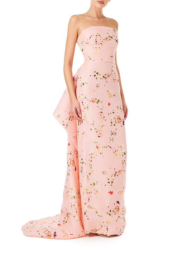 Monique Lhuillier strapless column gown in pink peony flora gazar fabric with tufted bustle train.