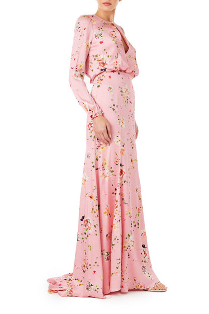 Monique Lhuillier peony floral long sleeve gown with keyhole bodice and draped back.