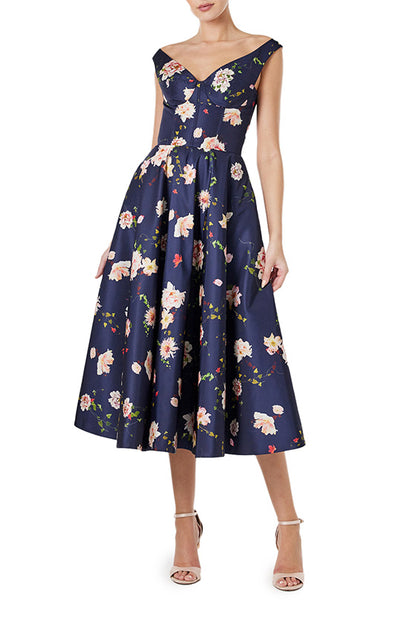 Monique Lhuillier navy floral midi dress with off the shoulder neckline, fit & flare skirt and pockets.