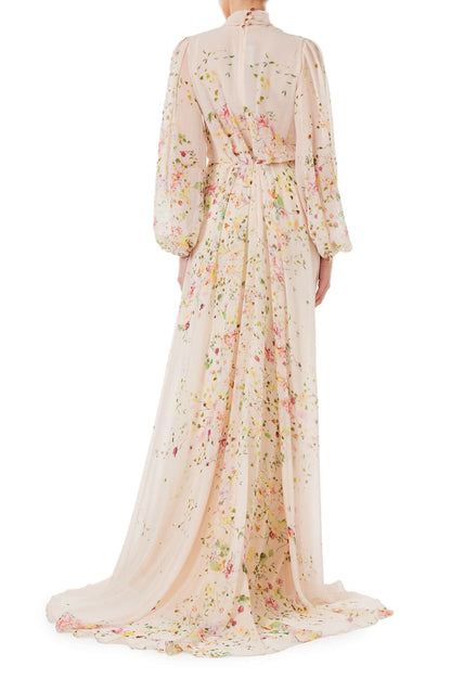 Monique Lhuillier long sleeve gown with attached necktie and gathered waist in buff floral printed chiffon.