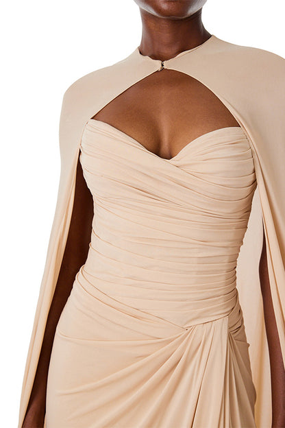 Monique Lhuillier floor length cape in sand colored matte jersey fabric.