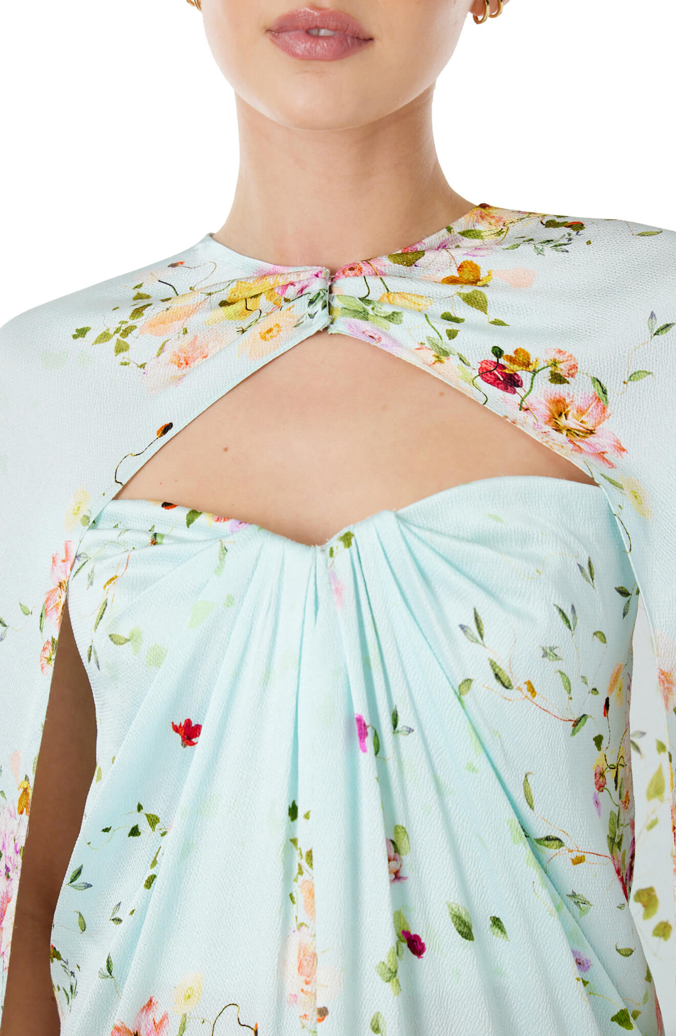 Monique Lhuillier strapless draped gown and cape in pistachio floral print fabric.