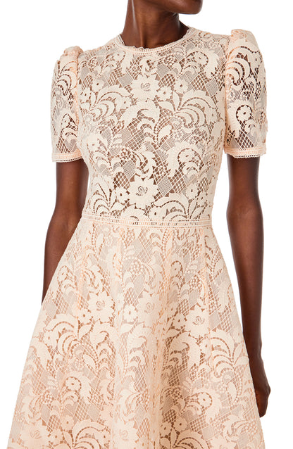 Monique Lhuillier short sleeve, midi length dress in blush creme lace.