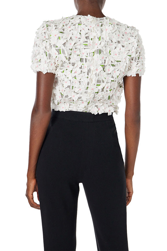 Monique Lhuillier crop top with short sleeves in silk white floral embroidery.