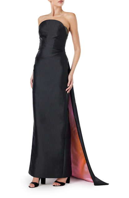 Monique Lhuillier strapless column gown in black silk faille with pink bi-color train.