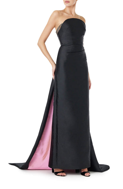 Monique Lhuillier strapless column gown in black silk faille with pink bi-color train.