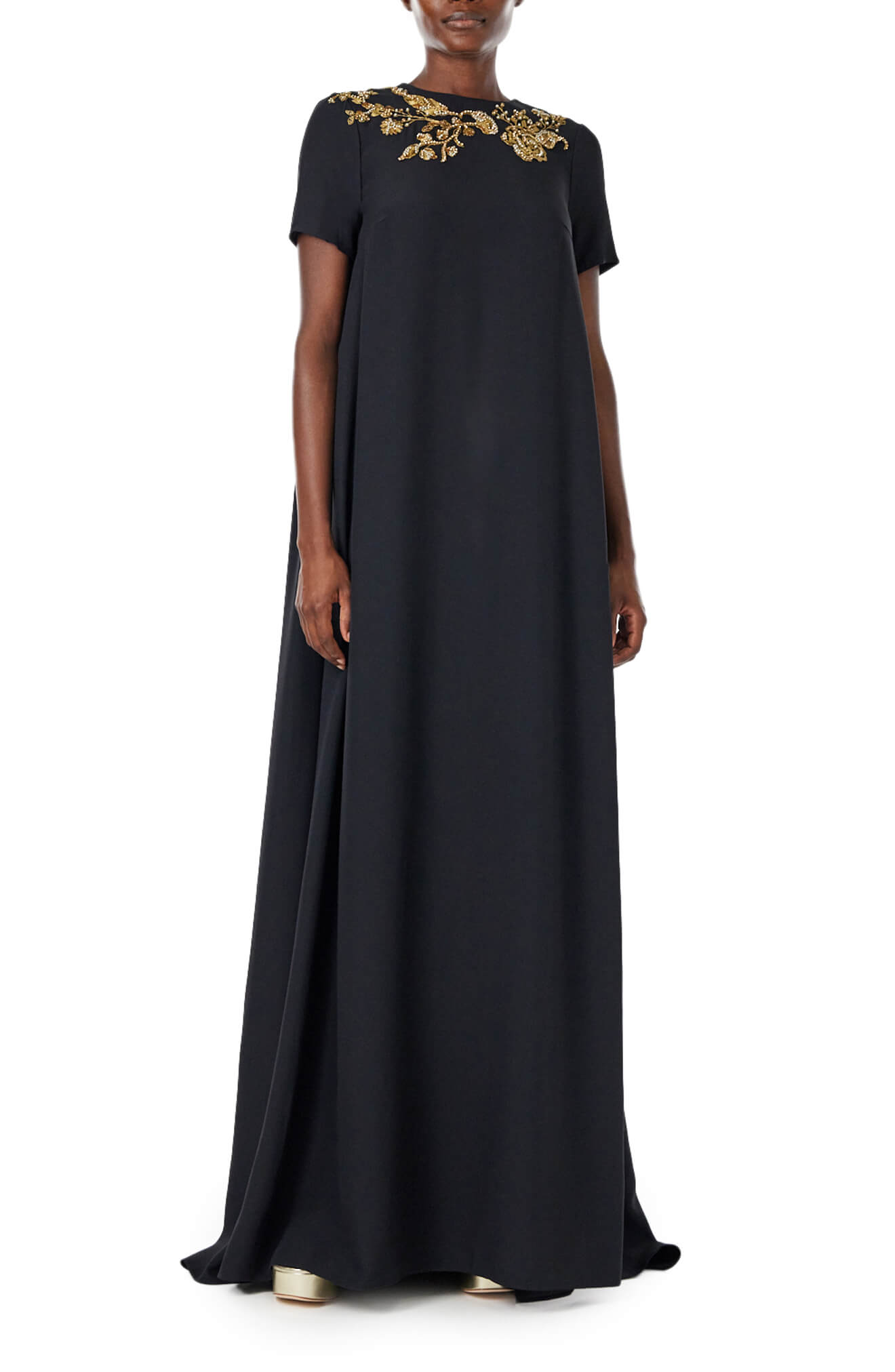 Monique Lhuillier black jewel neck, short sleeve caftan with gold embroidery.