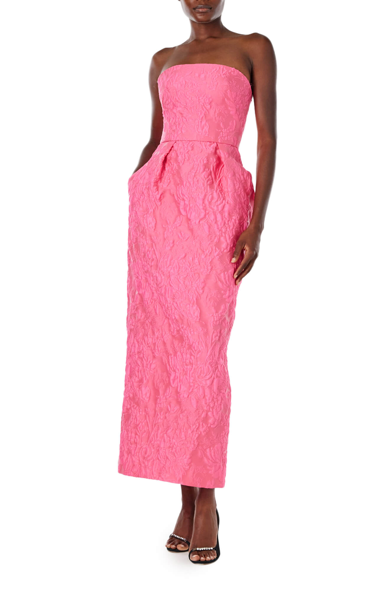 Monique Lhuillier Spring 2024 strapless midi length dress in fuchsia jacquard with tulip skirt and pockets - front.