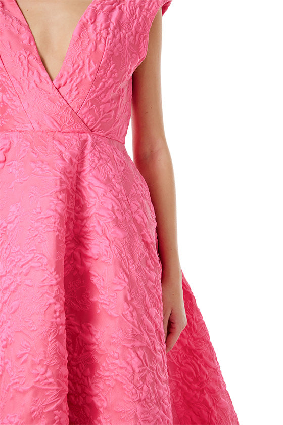 Monique Lhuillier Spring 2024 fuchsia jacquard ballgown with deep v neckline - front closeup.