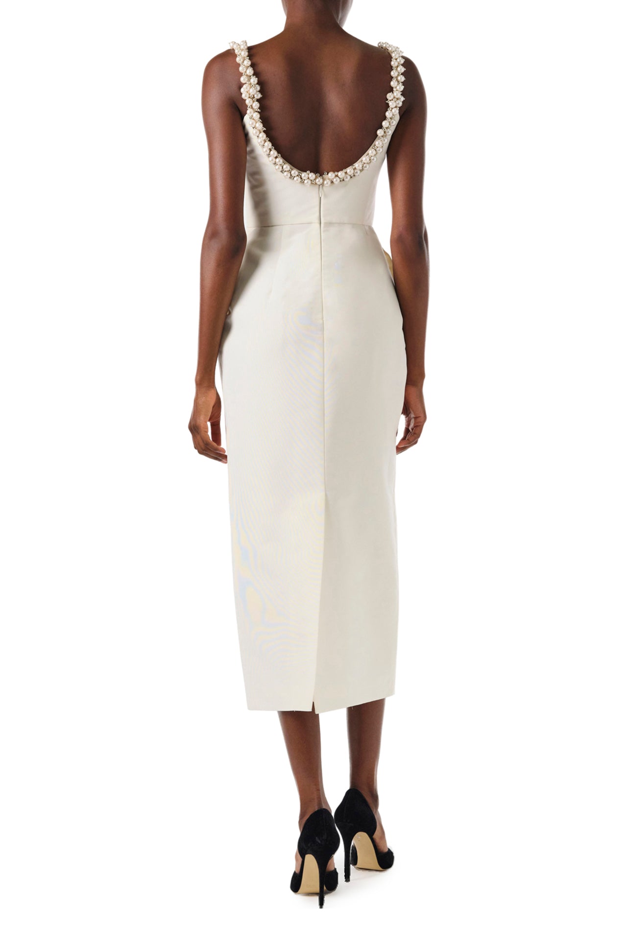 Monique Lhuillier Fall 2024 sleeveless, scoop neck cocktail dress with pearl embroidered neckline, low back, pockets, and natural waist seam - back.
