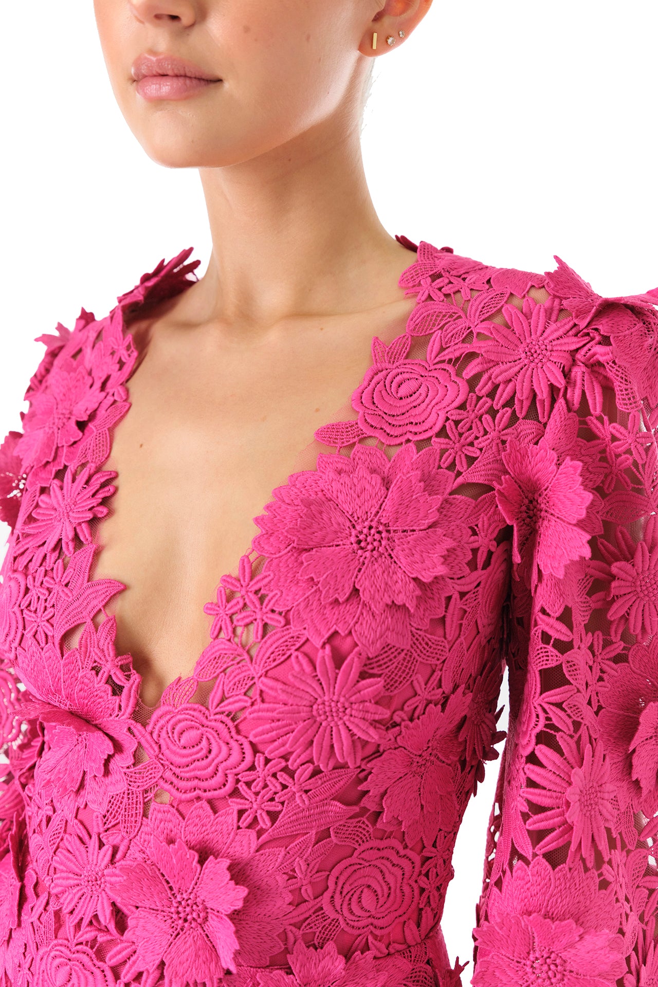 Monique Lhuillier Fall 2024 bell sleeve, floor length gown with deep v-neckline in Fuchsia 3D Guipure Lace - neckline.