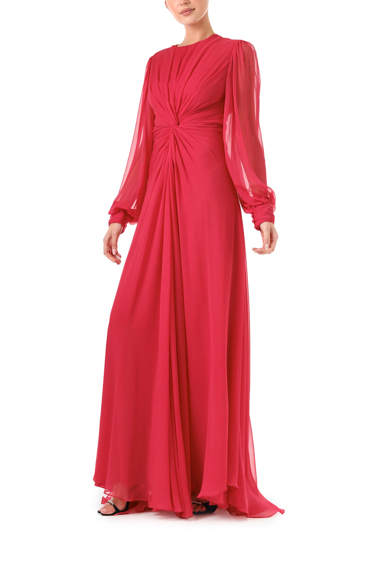 Monique Lhuillier Fall 2024 pomegranate chiffon, long sleeve gown with twist front detail, keyhole back and semi-sheer sleeves - side.