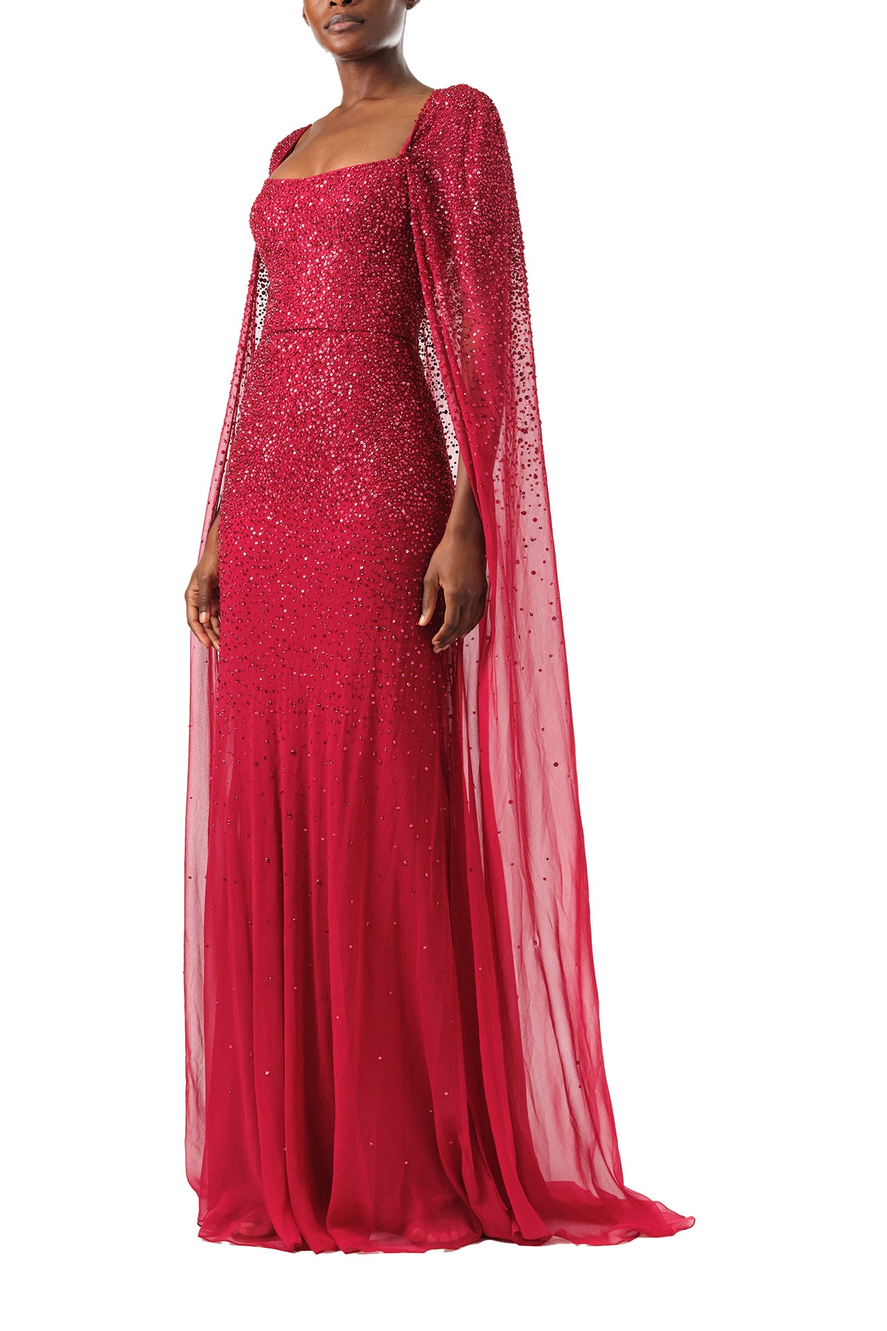 Monique Lhuillier Fall 2024 Scoop neck, floor length gown with integral cape in Merlot embroidered chiffon - left side.