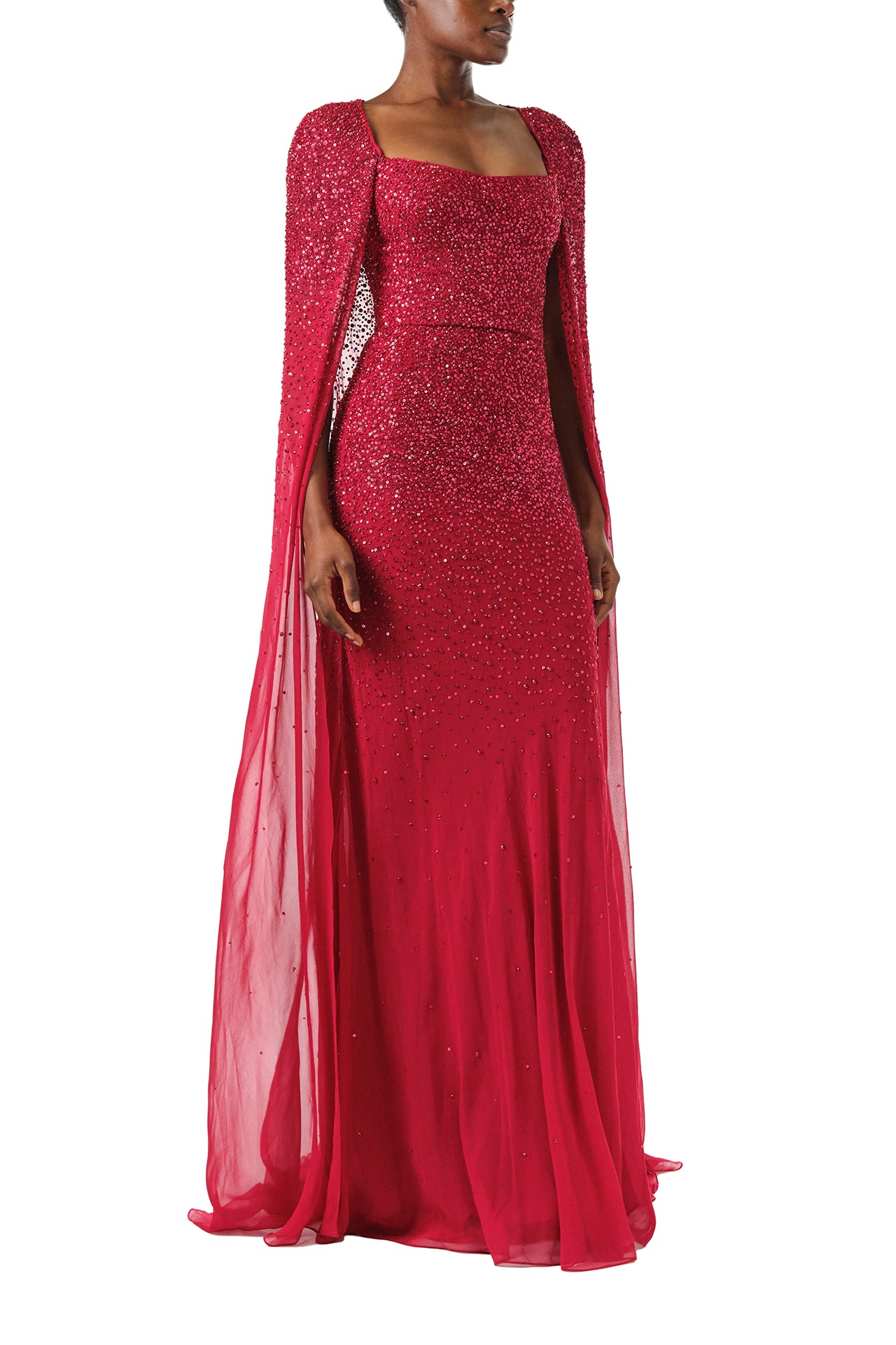 Monique Lhuillier Fall 2024 Scoop neck, floor length gown with integral cape in Merlot embroidered chiffon - right side.