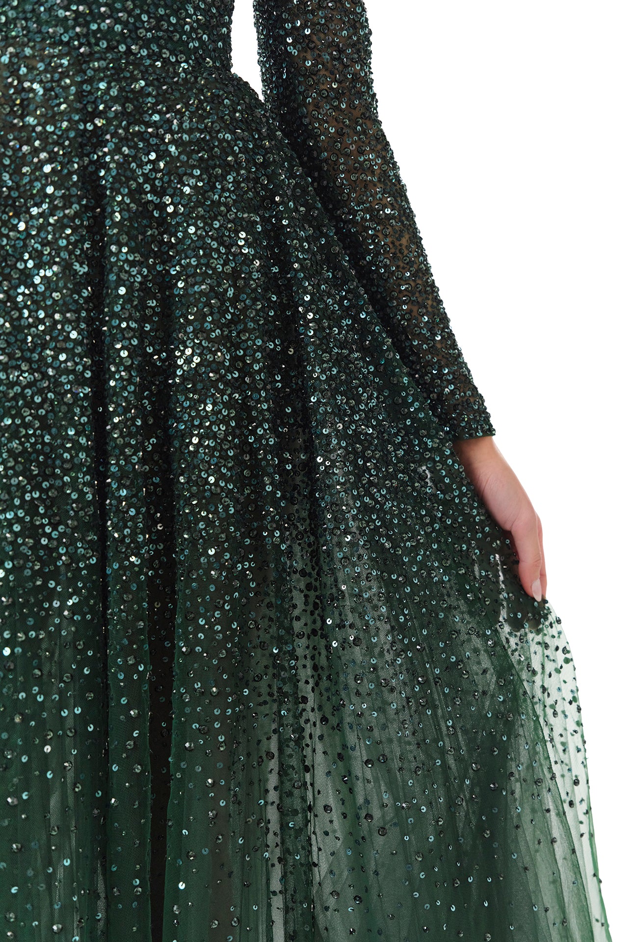 Monique Lhuillier Fall 2024 Juniper green embroidered tulle gown with long sleeves and off the shoulder neckline - fabric detail.