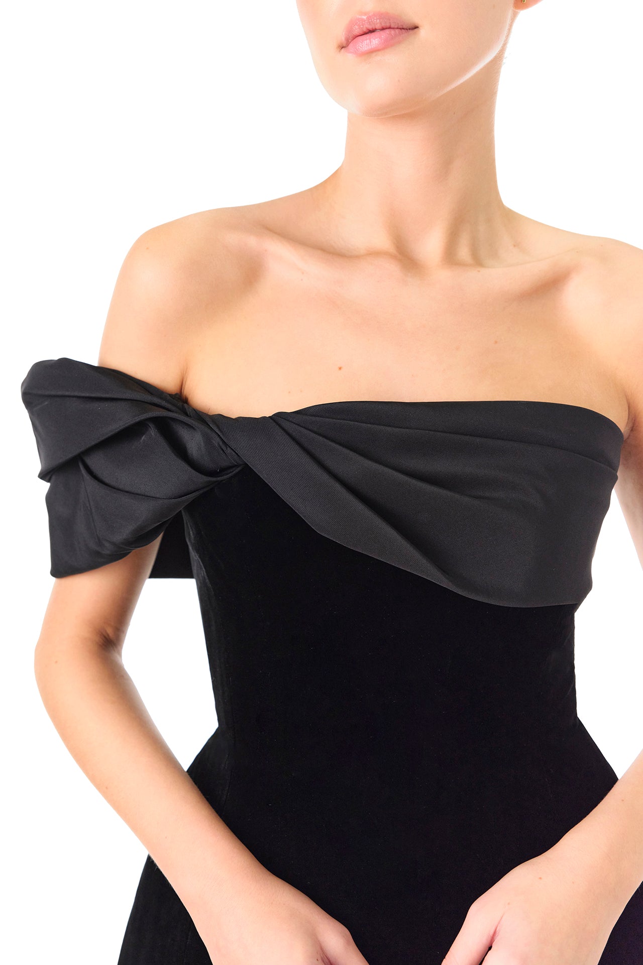 Monique Lhuillier Fall 2024 black off the shoulder, structured mini dress with draped asymmetric neckline - neckline.