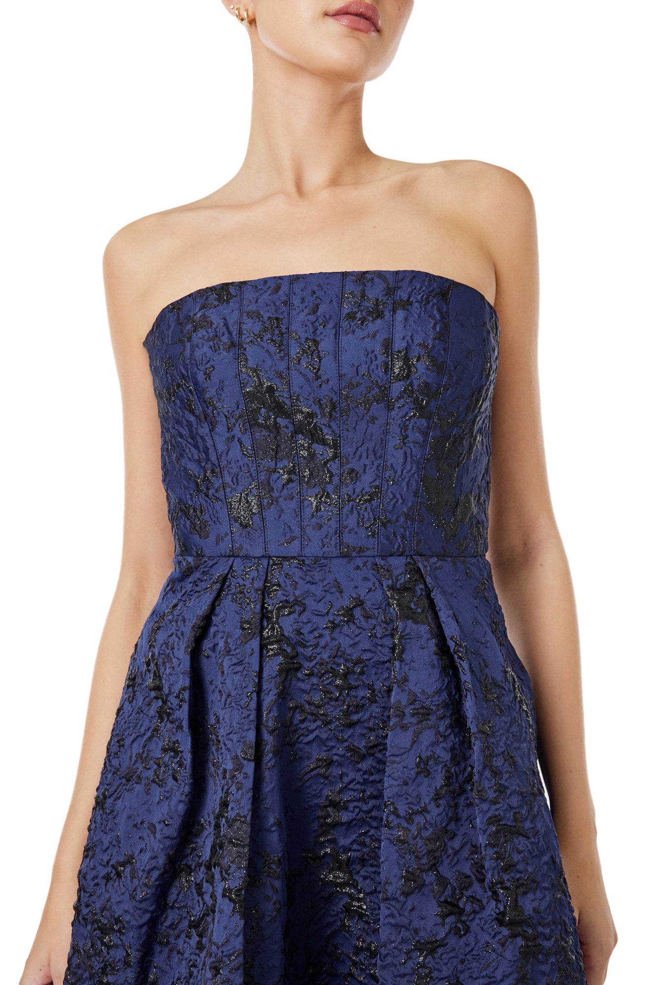 ML Monique Lhuillier strapless, midi-length dress in metallic navy jacquard.