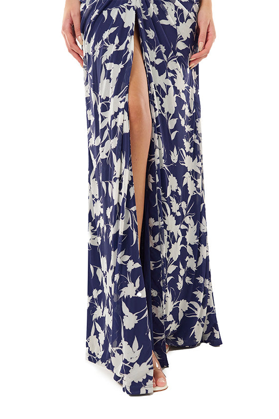 ML Monique Lhuillier floor length dress with halter neckline and ruching in indigo printed mesh.