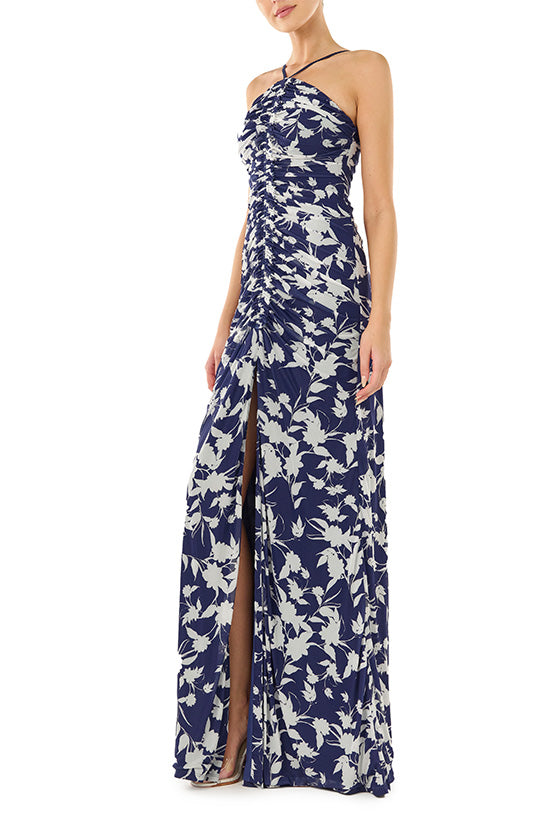 ML Monique Lhuillier floor length dress with halter neckline and ruching in indigo printed mesh.