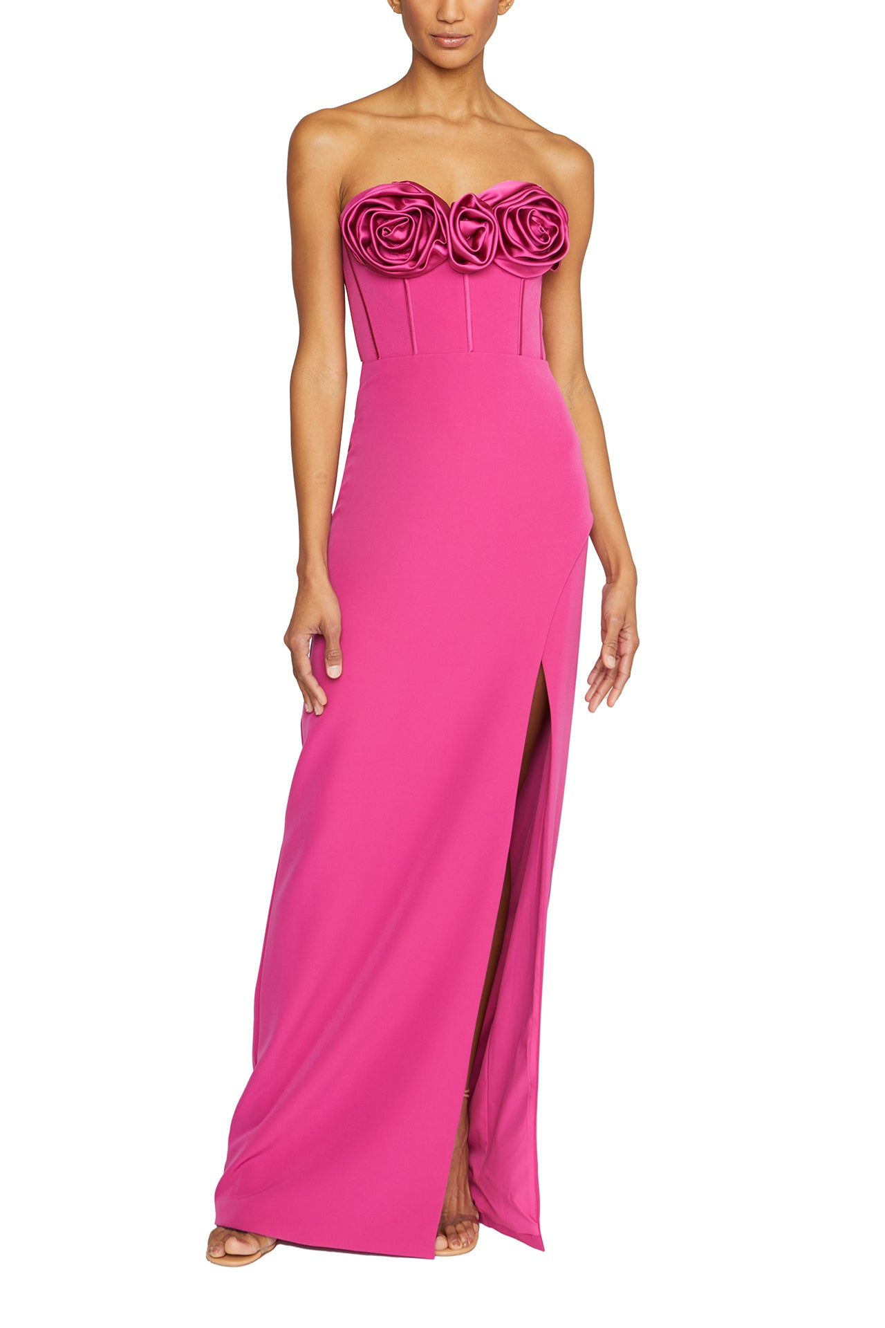 Strapless column gown with corseted bodice and rosette detail at front neckline in Cerise Pink crepe- front