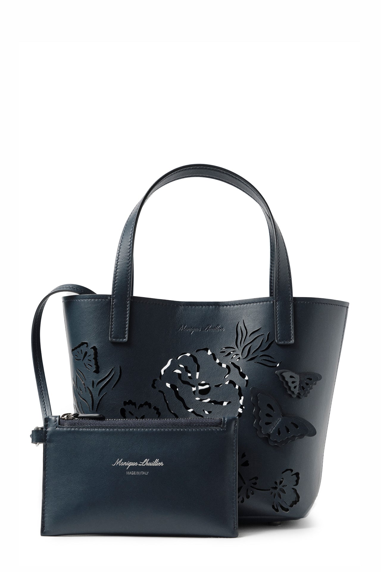 Leather top handle mini tote bag with laser cut florals, three-dimensional leather butterflies and small zip pouch in Navy- front with zip pouch