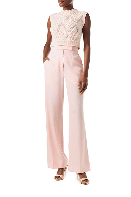 Monique Lhuillier Fall 2024 sleeveless, bobble crop tank in pale blush wool cable knit - front.