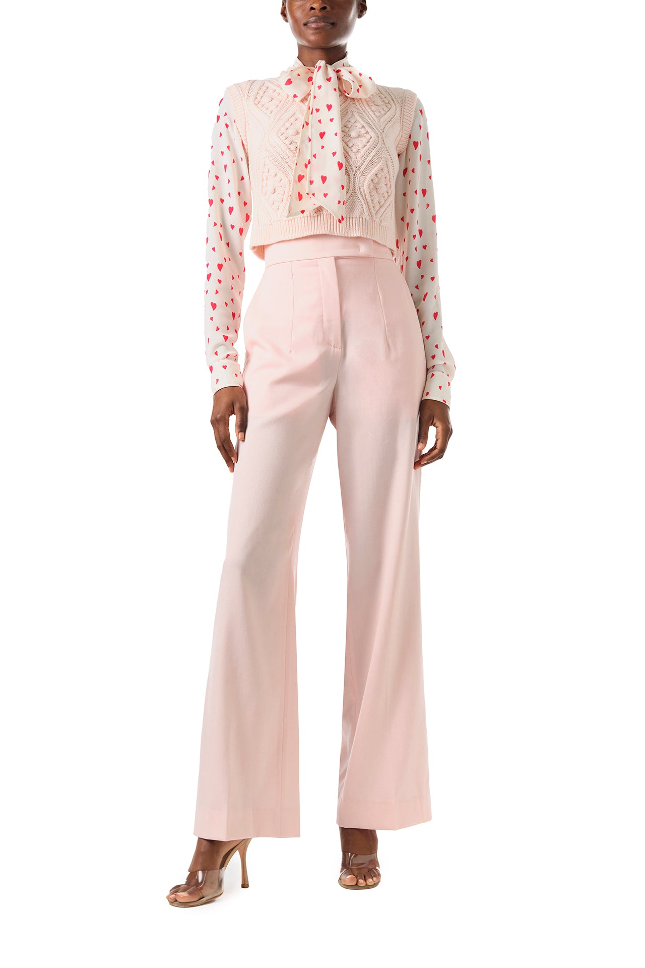 Monique Lhuillier Fall 2024 sleeveless, bobble crop tank in pale blush wool cable knit - front with heart print blouse.