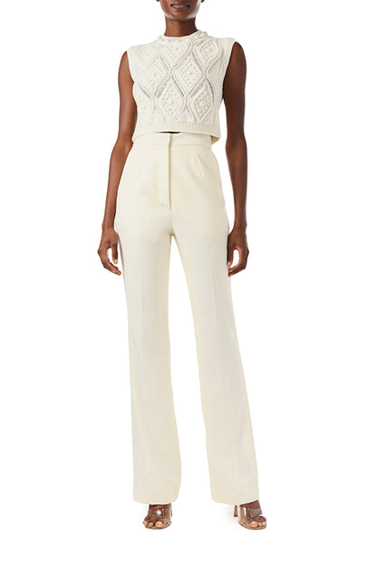 Monique Lhuillier Fall 2024 sleeveless, bobble crop tank in Creme wool cable knit - front.