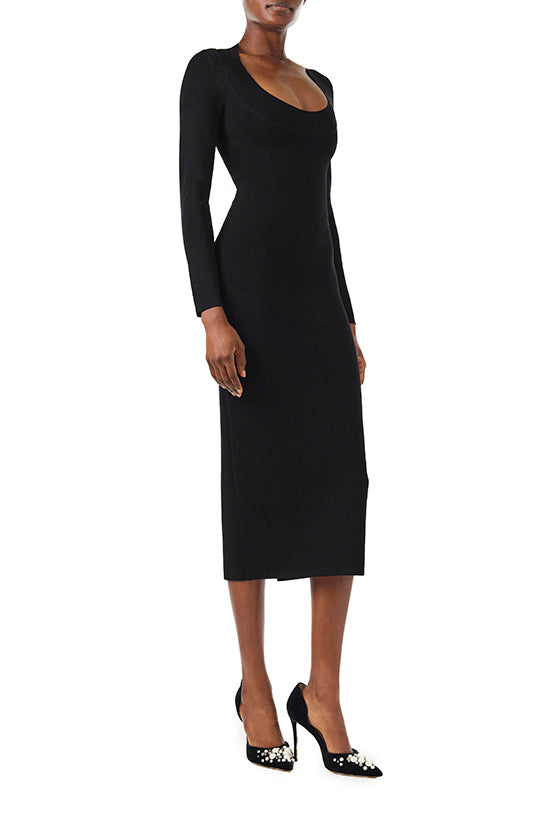 Monique Lhuillier Fall 2024 black knit midi dress with scoop neck and long sleeves - right side.