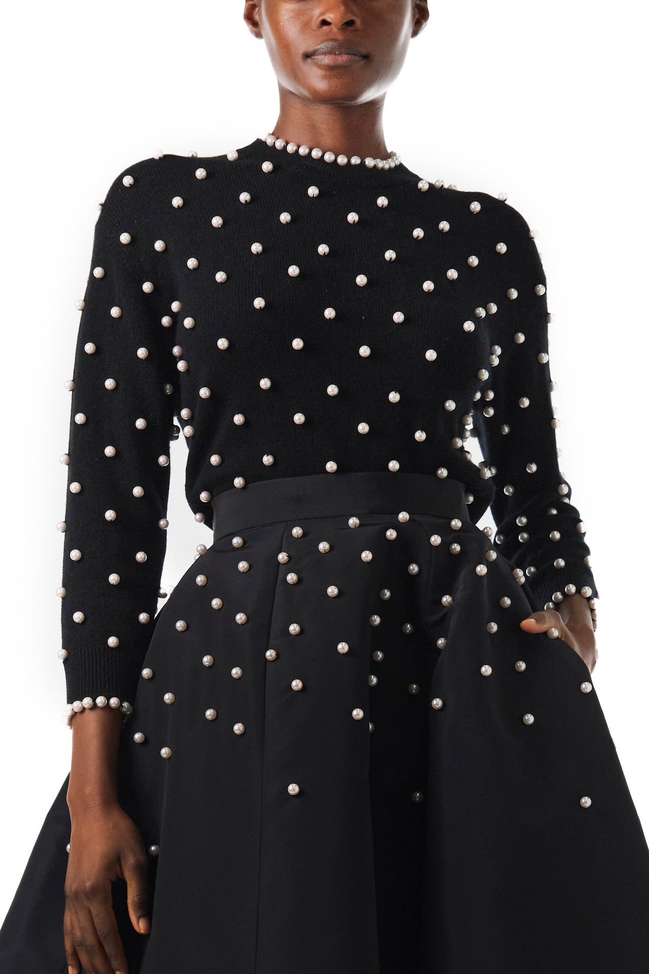 Monique Lhuillier Long sleeve Noir cashmere sweater with pearl embroidery and pearl trim at neckline and wrists - front.