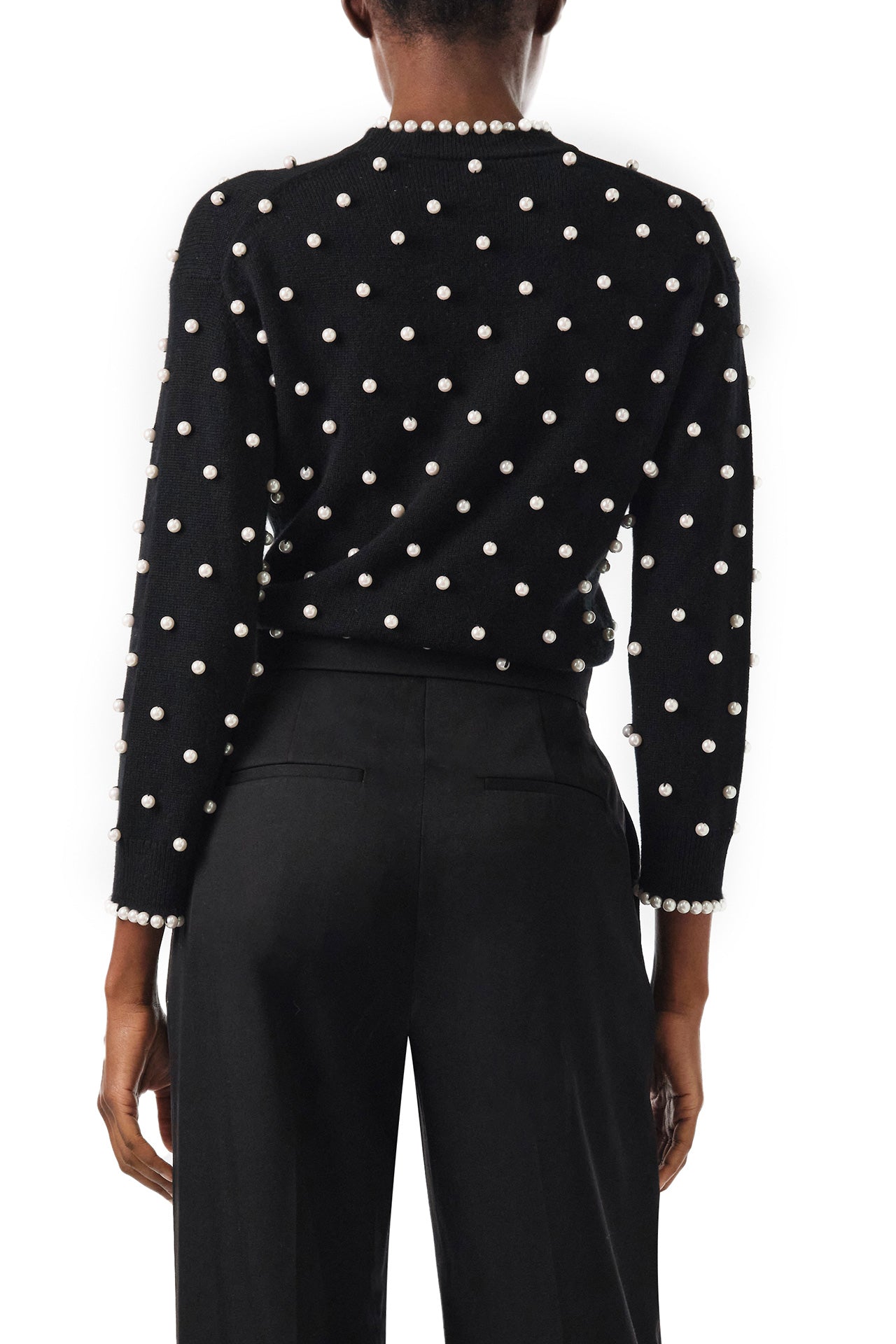 Monique Lhuillier Long sleeve Noir cashmere sweater with pearl embroidery and pearl trim at neckline and wrists - back.