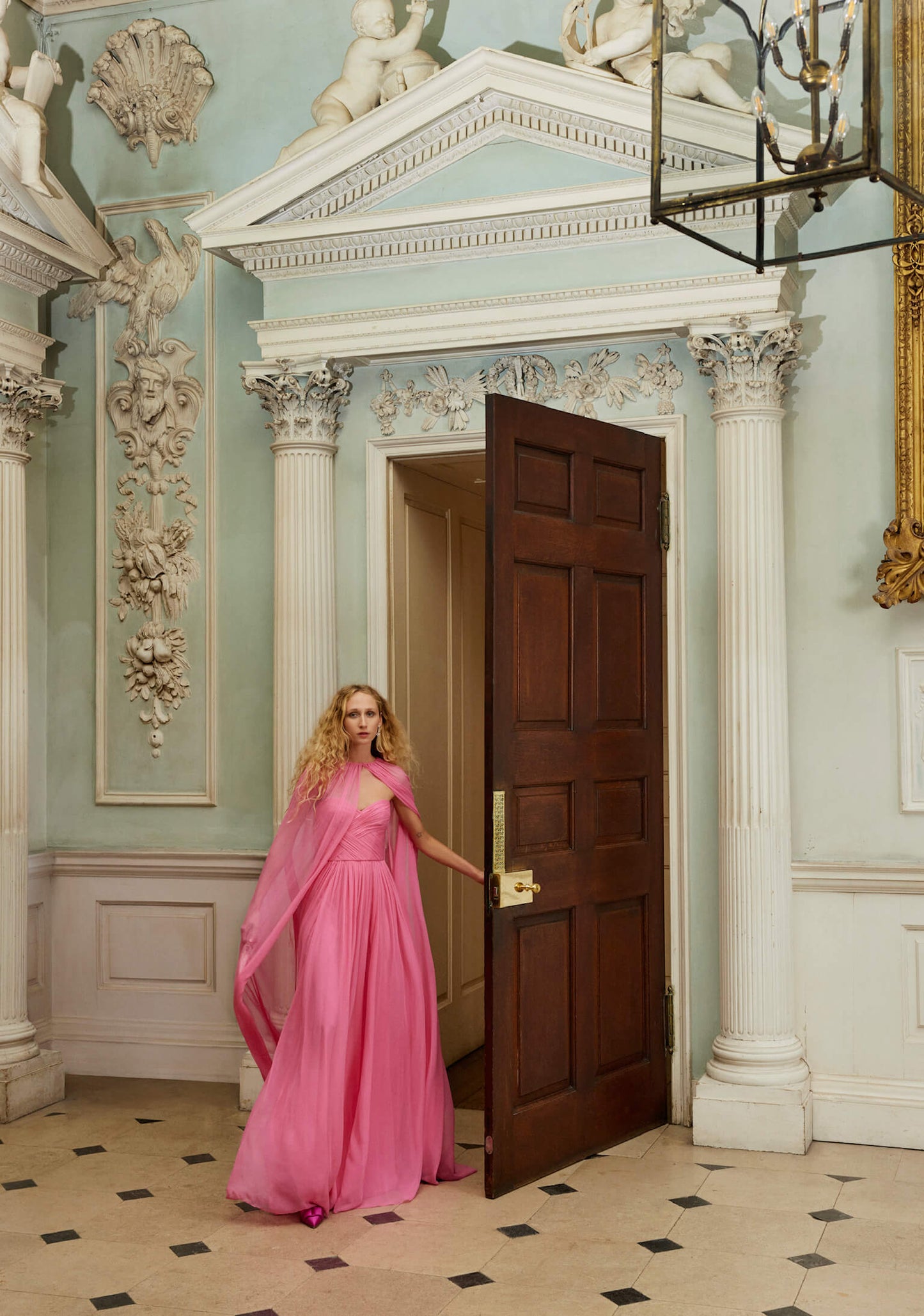 Monique Lhuillier Fall 2024 floor length, sheer pink chiffon  cape - look book photo.